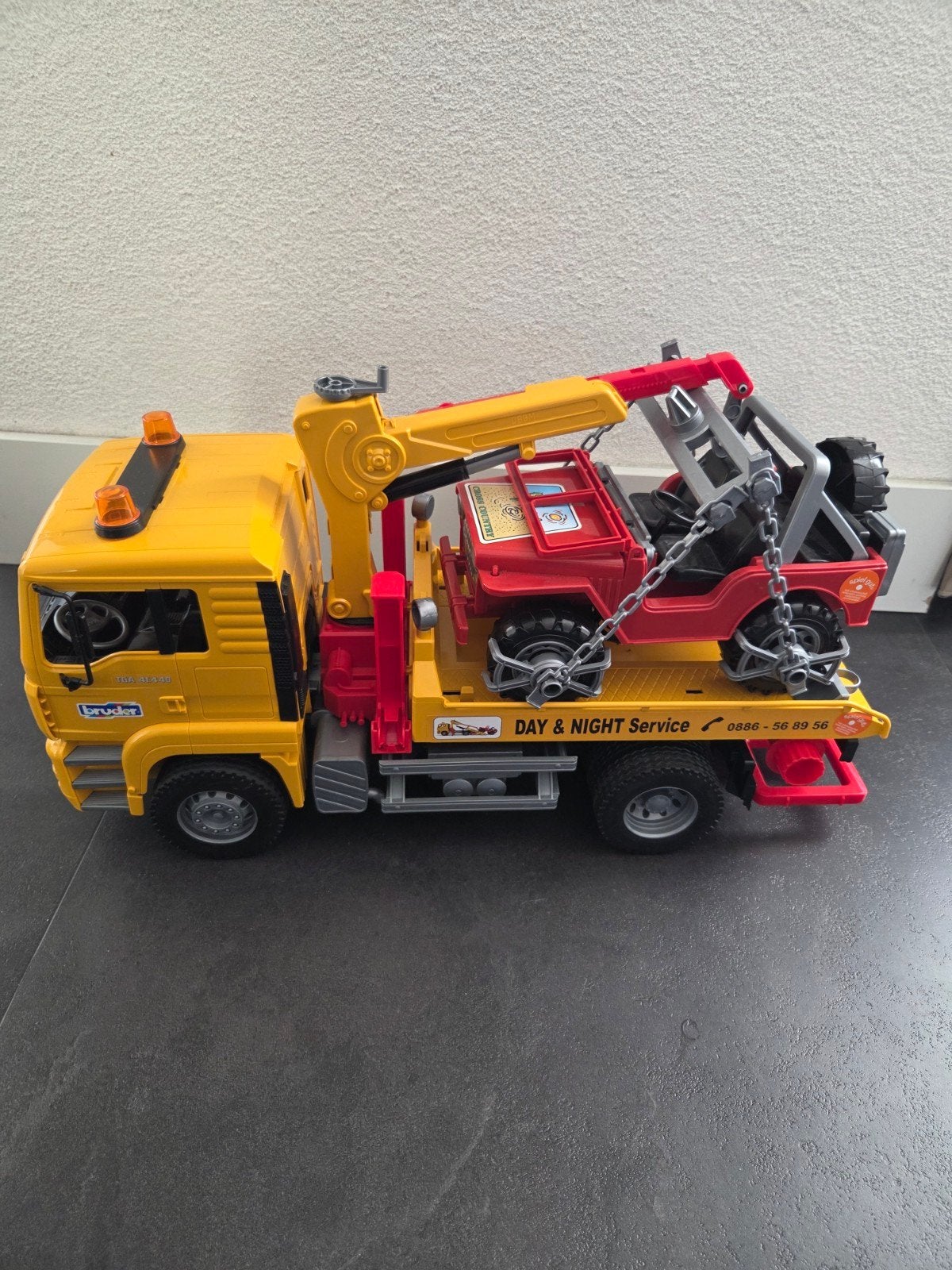 Bruder Takelwagen met Jeep - Zo goed als nieuw, Ophalen