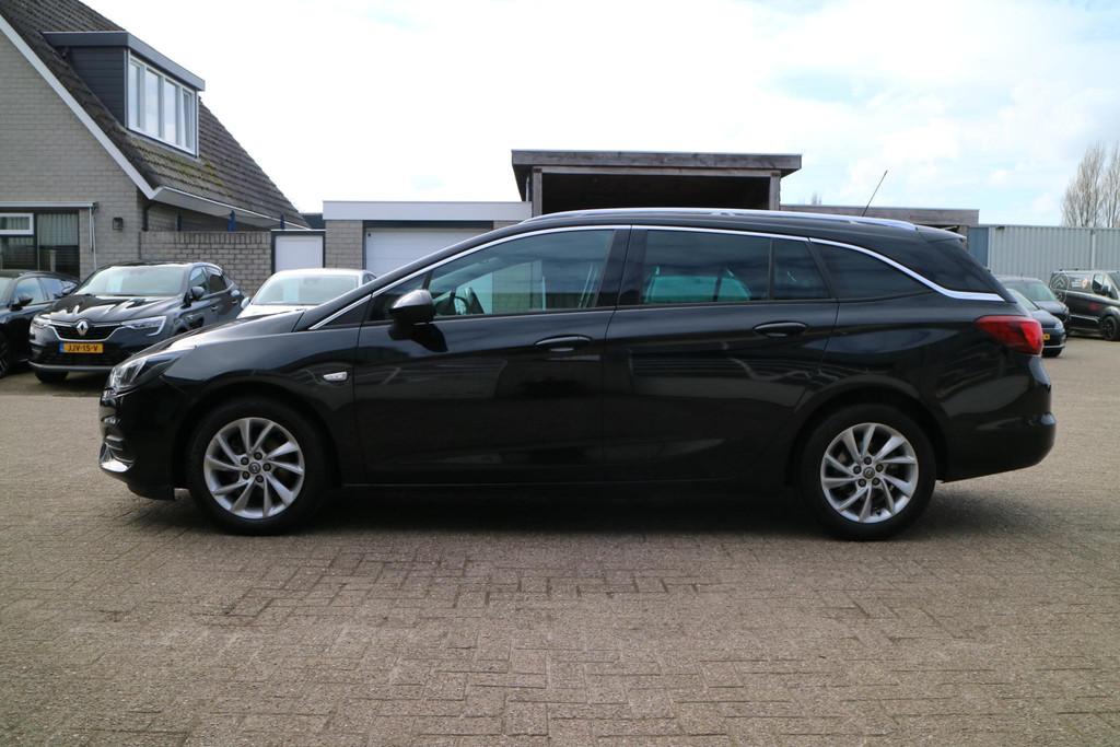 Opel Astra Sports Tourer 1.2 Blitz Edition | Camera | Carpla, Stof, Gebruikt, 1199 cc, Zwart