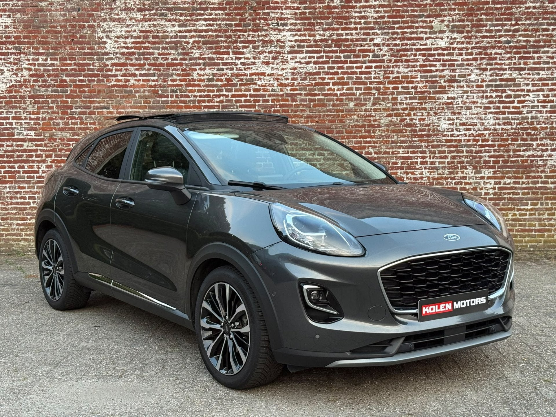 Ford Puma 1.0 EcoBoost Hybrid Titanium -PANO-B&O-CARPLAY, Auto's, Lichtsensor, Zwart, 1226 kg, Leder en Stof