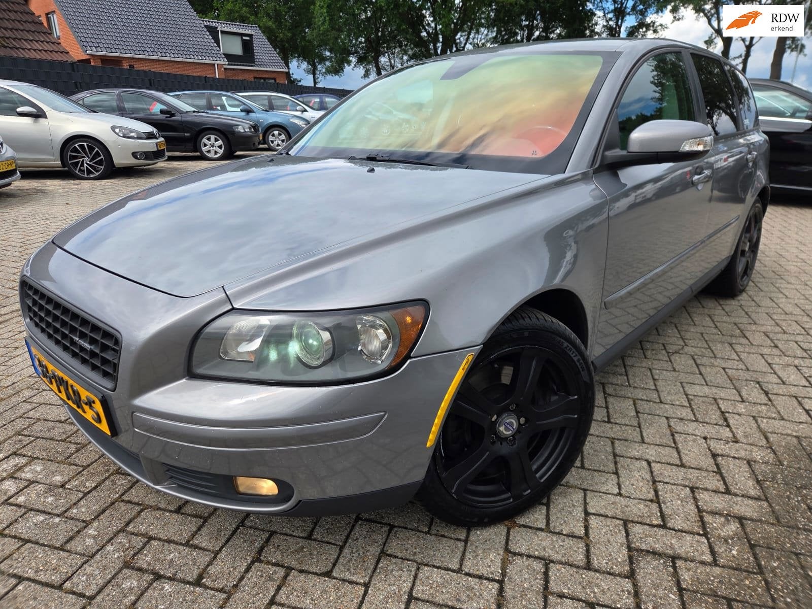 Volvo V50 2.4 D5 Summum 2006 Automaat/Leder/Climate/Cruise/X, Auto's, Volvo, Gebruikt, 1436 kg, Grijs, 154 €/maand