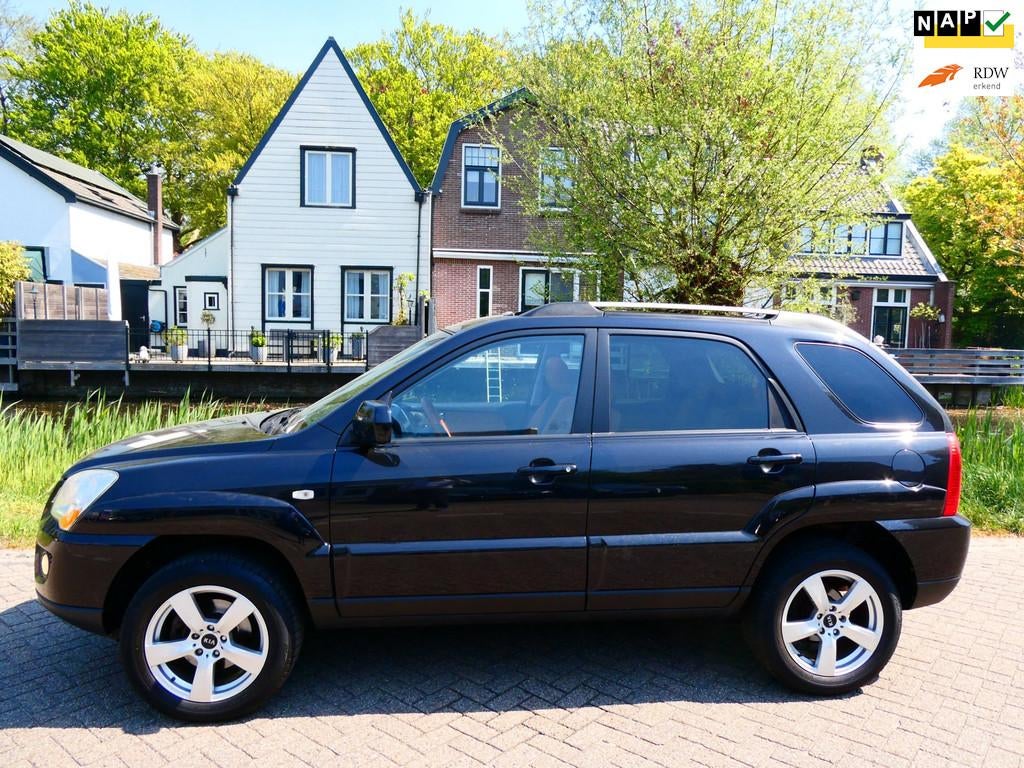 Kia Sportage 2.0 CVVT 142pk Clima Cruise Leder Schuifdak Tre, 1442 kg, Gebruikt, 4 cilinders, Zwart