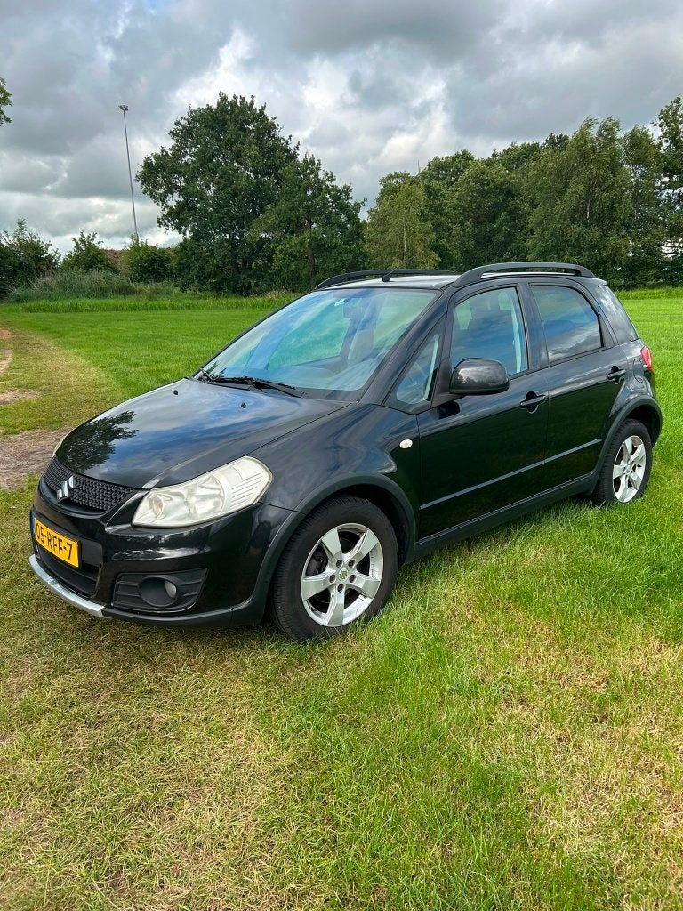 Suzuki SX4 1.6 2011 Zwart, Voorwielaandrijving, Euro 5, Stof, 4 cilinders