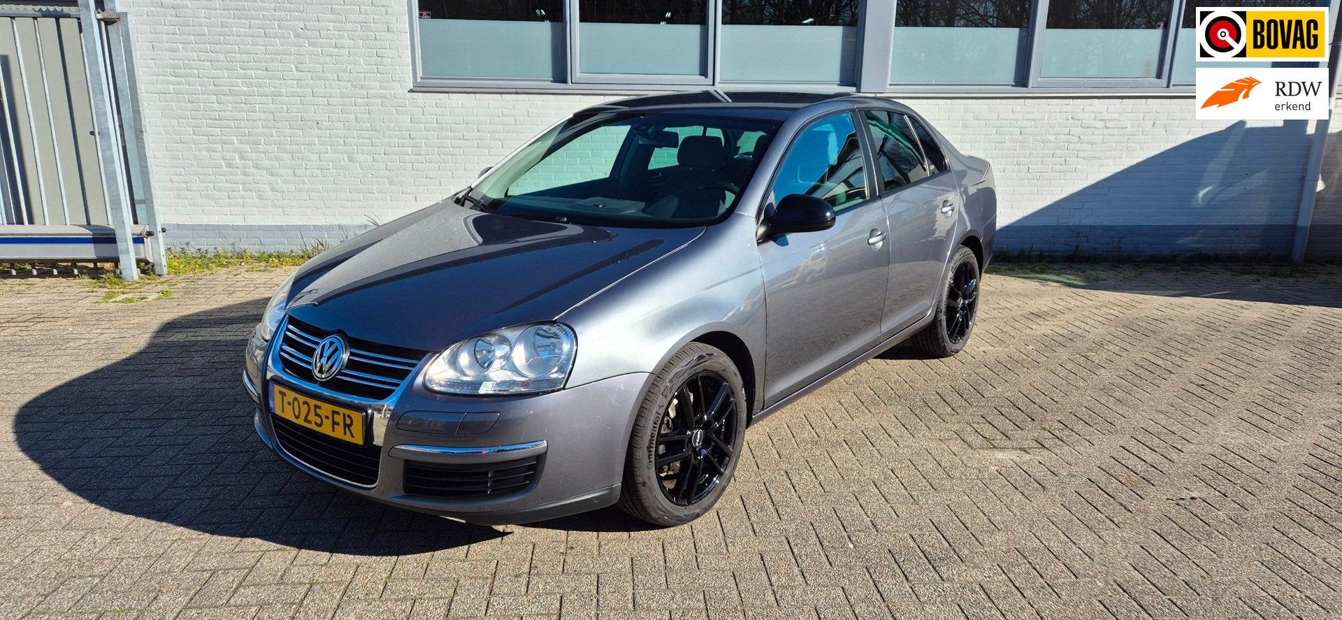Volkswagen Jetta 2.0 FSI Sportline, Stof, Gebruikt, Zwart, 4 cilinders