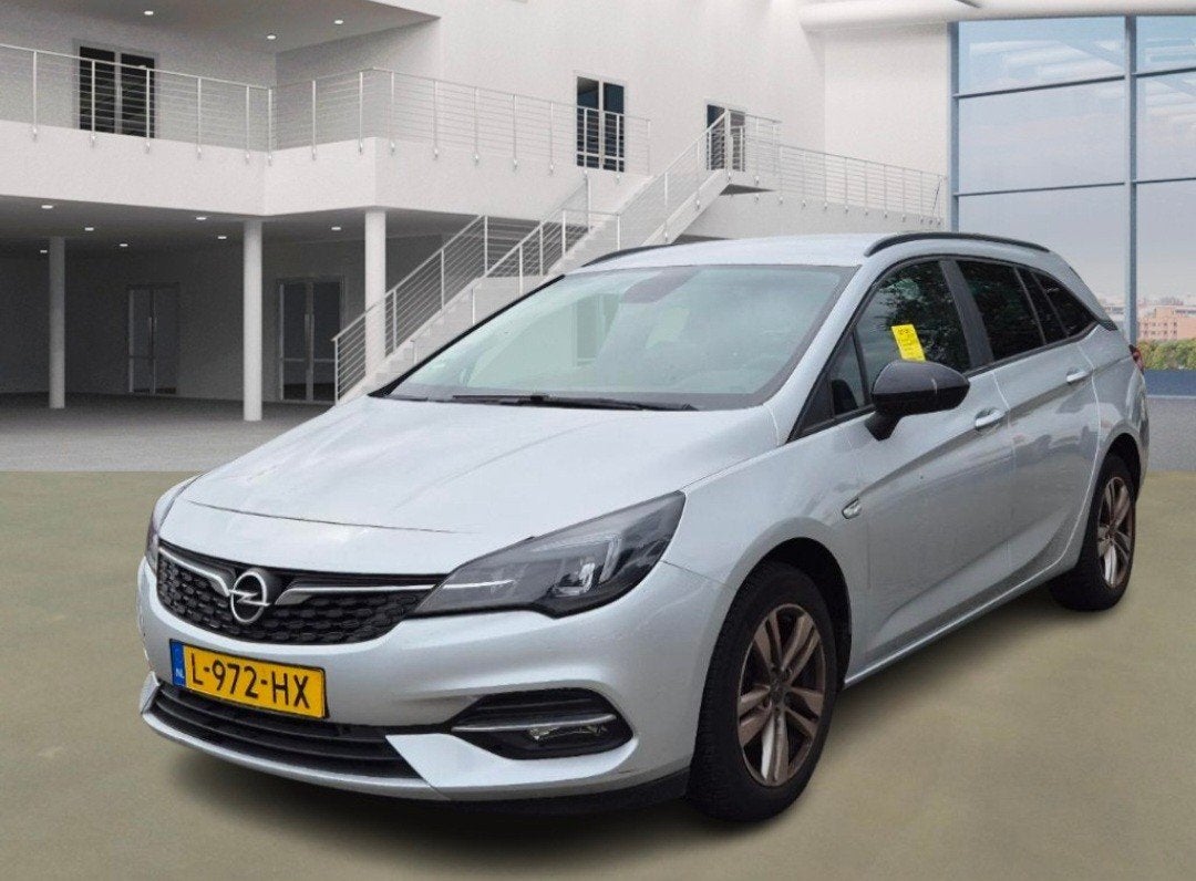 Opel Astra 1.2 Turbo 110pk 2021 motor defect, Incl btw, Auto's, Voorwielaandrijving, Stof, 1199 cc, Wit