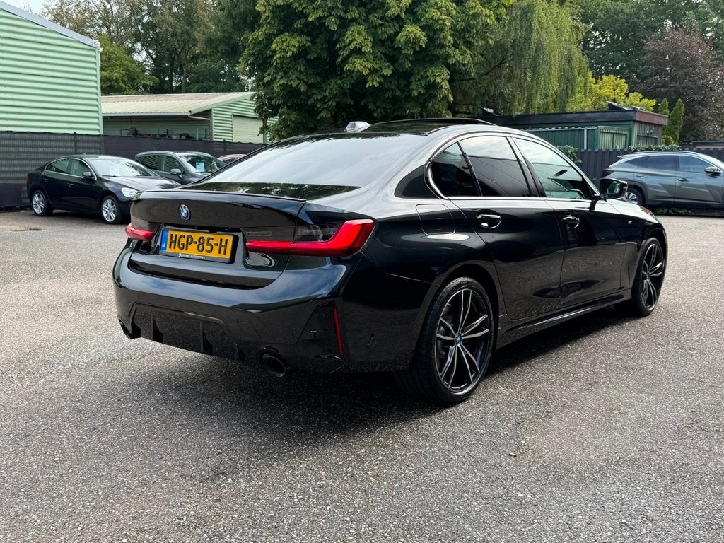 BMW 3-Serie 320e M-Sport Edition Schuifdak 1e eigenaar NL, Auto's, Achterwielaandrijving, Gebruikt, 4 cilinders, Bedrijf