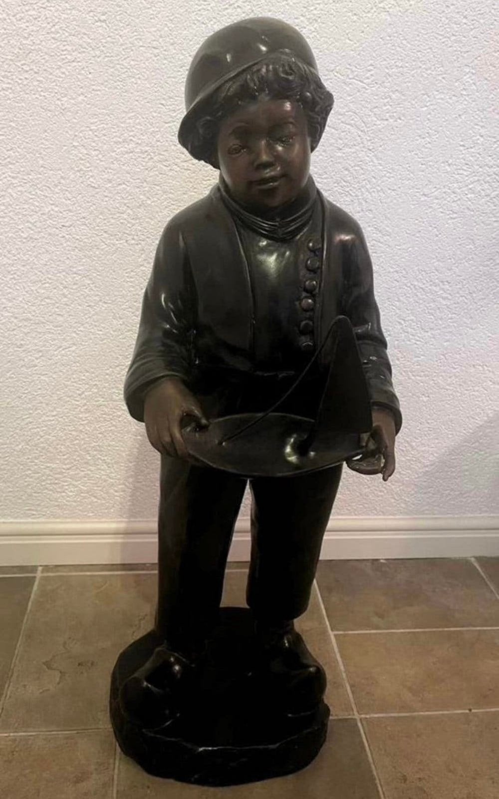 Bronzen jongetje, Ophalen, Brons