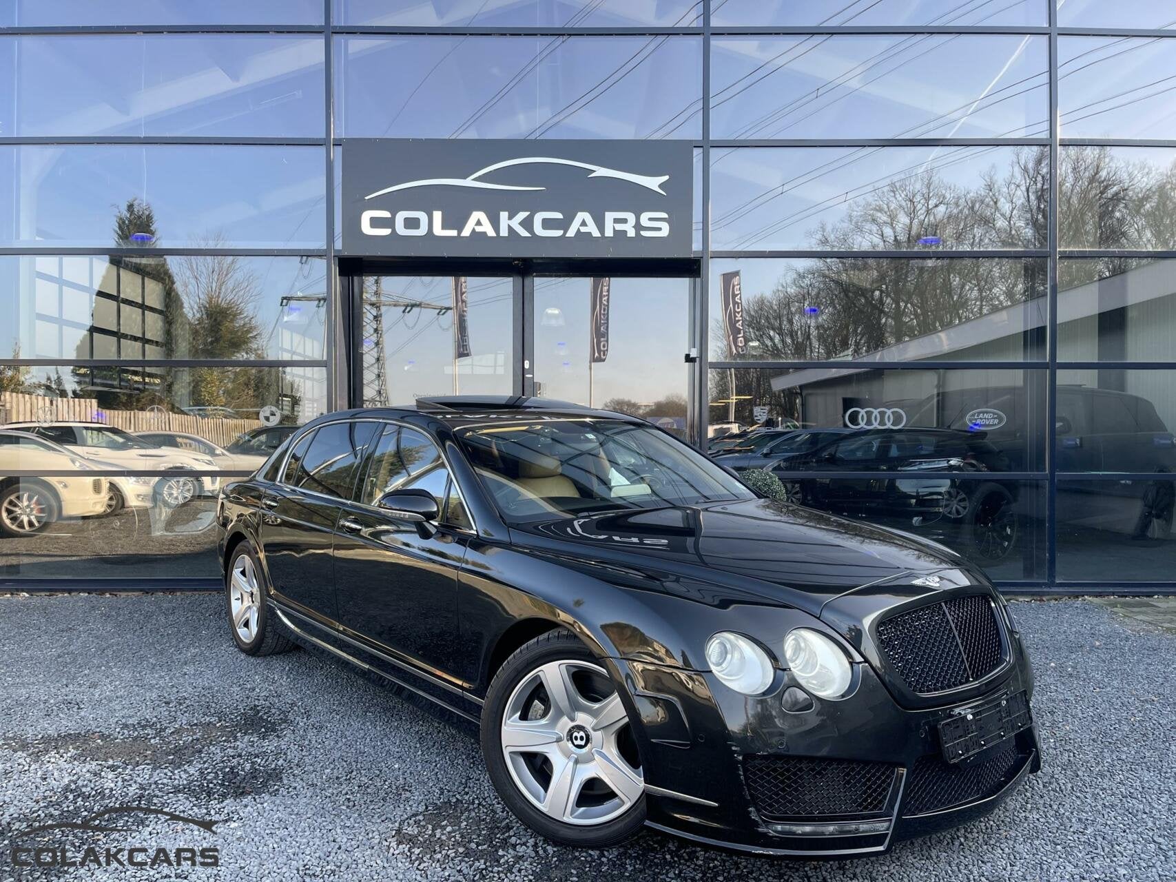 Bentley Continental 6.0 W12 Mansory Garantie nieuw !, Auto's, Bentley, Gebruikt, 12 cilinders, Zwart, Leder