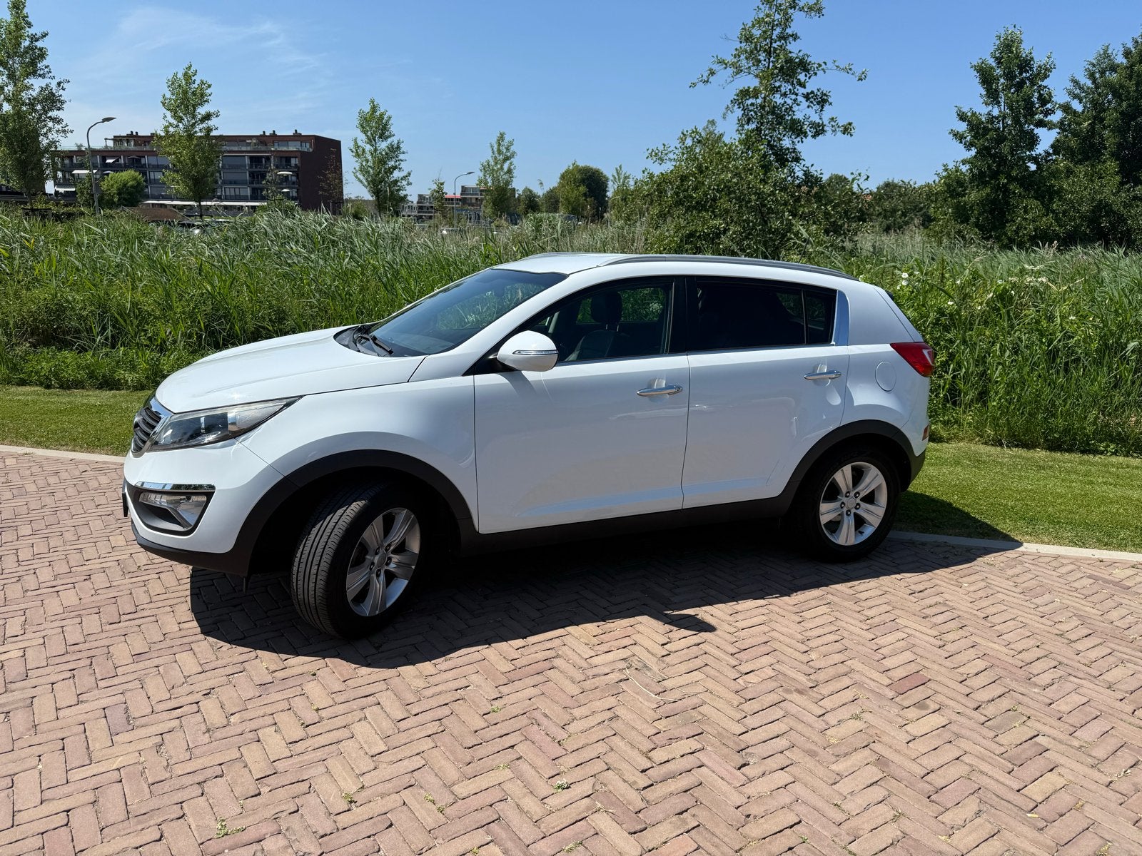 Kia Sportage 1.6 GDI 2WD 2011 Wit, Auto's, Voorwielaandrijving, 15 km/l, 1280 kg, 1591 cc