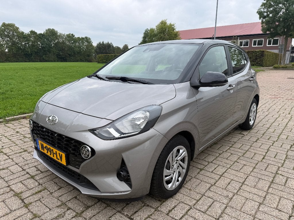 Hyundai i10 1.0i 67pk Automaat  2021/2022 Grijs, Auto's, 899 kg, Origineel Nederlands, Bedrijf, 19 km/l