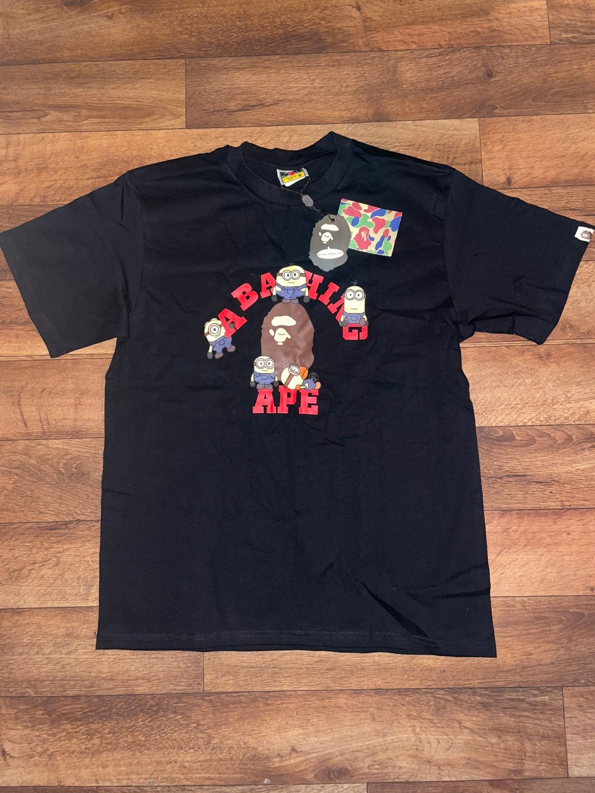 A Bathing Ape x Minions T-shirt, Ophalen of Verzenden, Nieuw, Maat 48/50 (M), Zwart