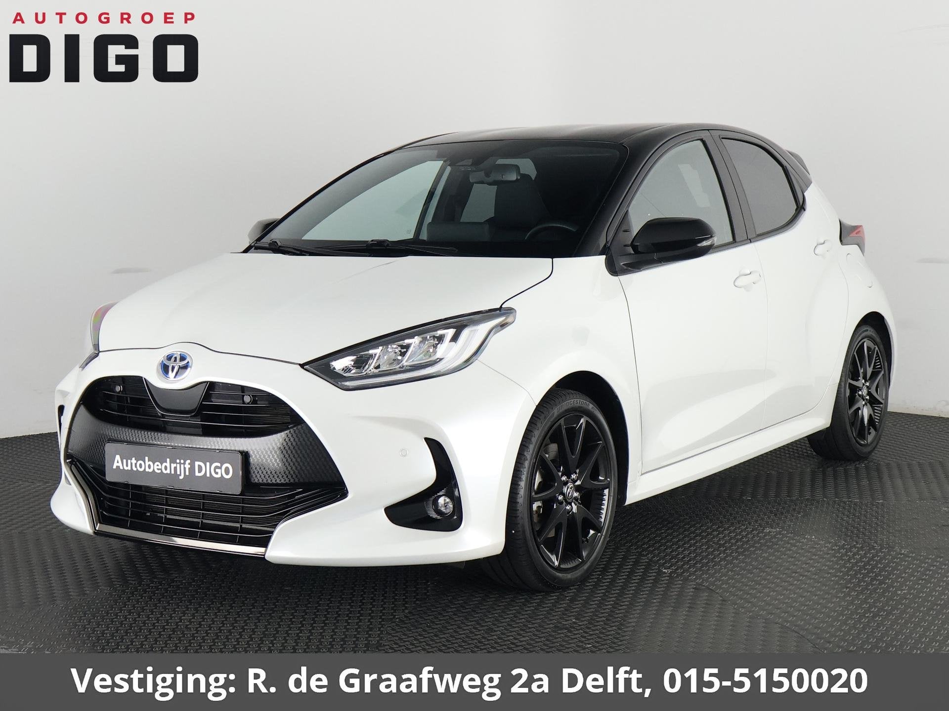 Toyota Yaris 1.5 Hybrid Executive Bi-Tone | Stoelverwarming, Auto's, Automatische klimaatregeling, Gebruikt, Wit, Bedrijf