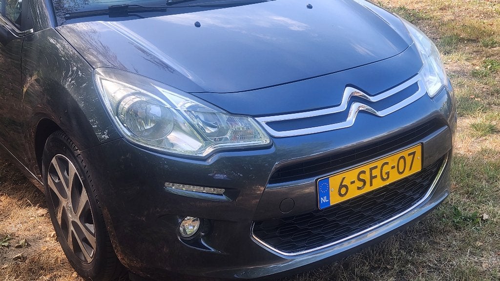 Citroën C3 1.2 VTI 60KW/82PK 2013 Grijs, Auto's, Voorwielaandrijving, Stof, 1199 cc, Origineel Nederlands