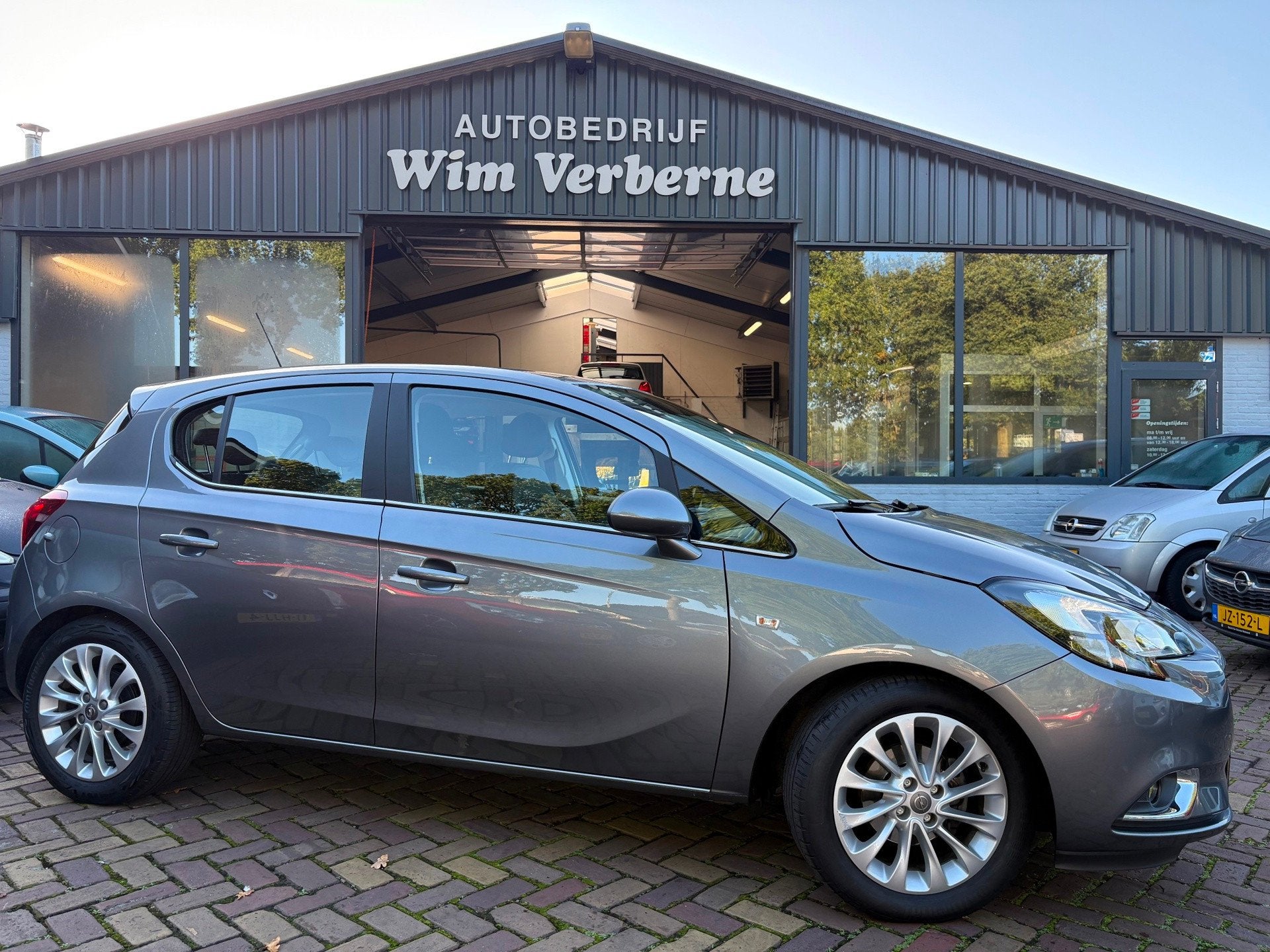 Opel Corsa 1.4 Innovation Automaat/Navigatie, Auto's, 1063 kg, Gebruikt, 4 cilinders, Leder en Stof