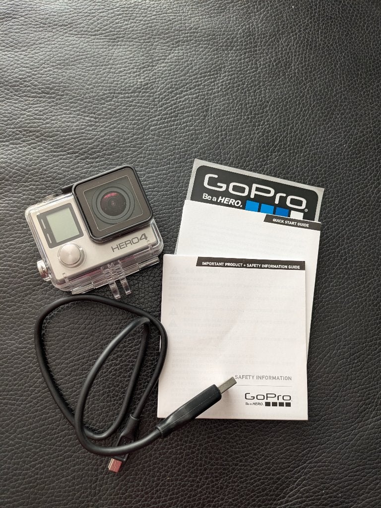 Foto 2 van Go pro hero 4 met accessoires