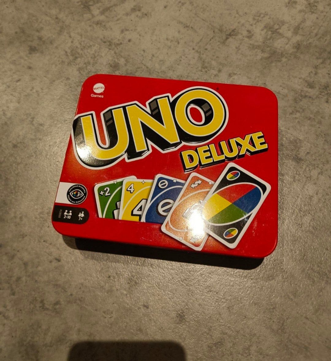 UNO Deluxe kaartspel in tinnen blik - Nieuw in seal, Drie of vier spelers, Ophalen of Verzenden, Nieuw, Mattel Games