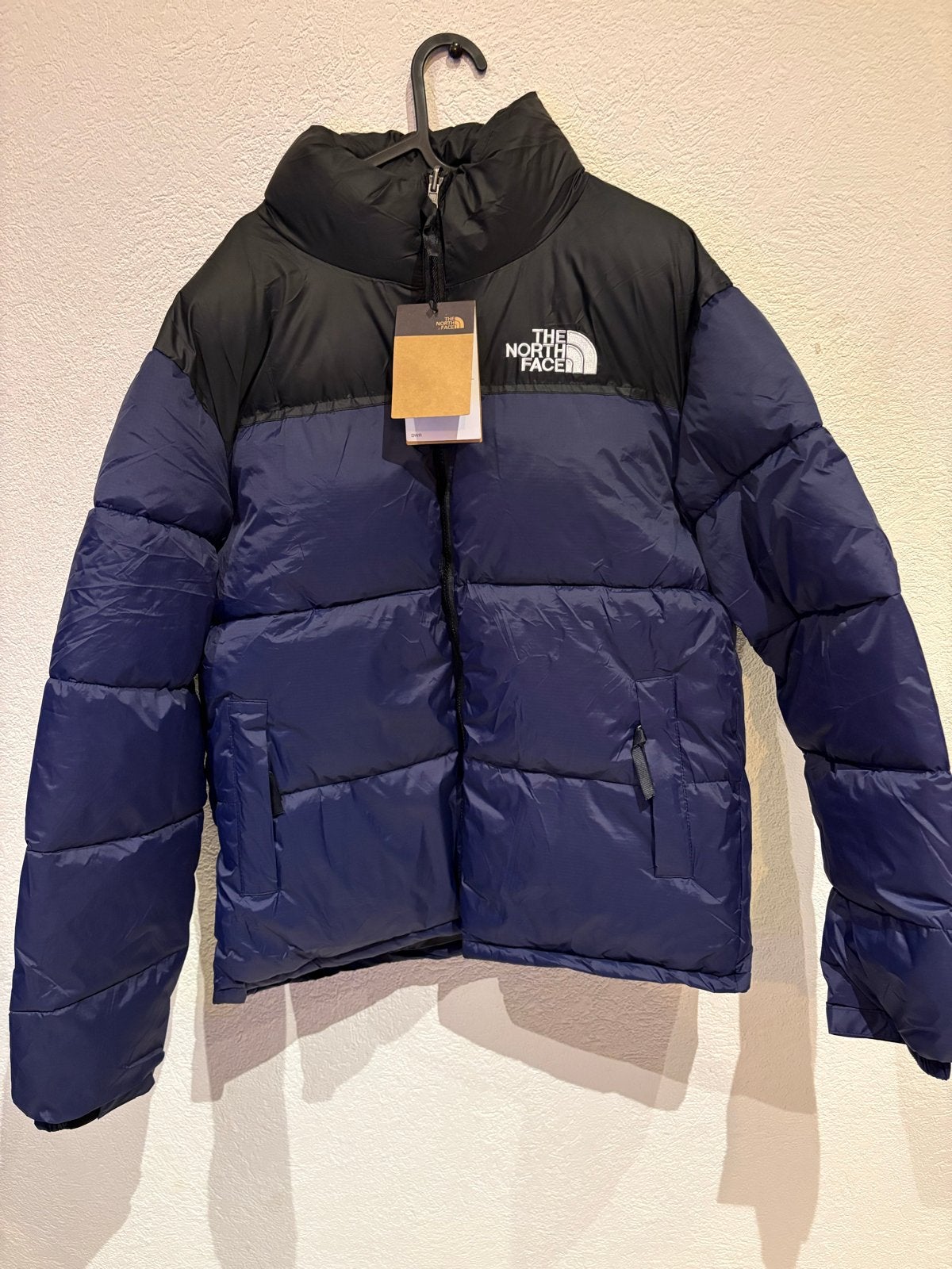 The North Face Nuptse Puffer Jas, Ophalen of Verzenden, Nieuw, Maat 48/50 (M), Blauw