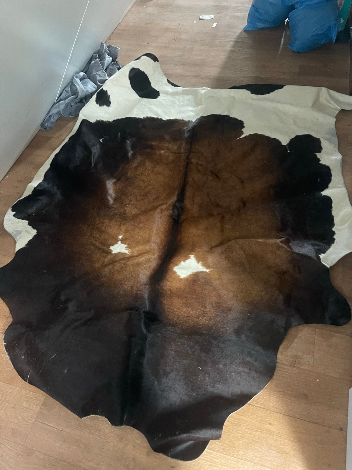 Net koeienhuid vloerkleed - Bruin, zwart en wit, Ophalen, Gebruikt, 100 tot 150 cm, Bruin