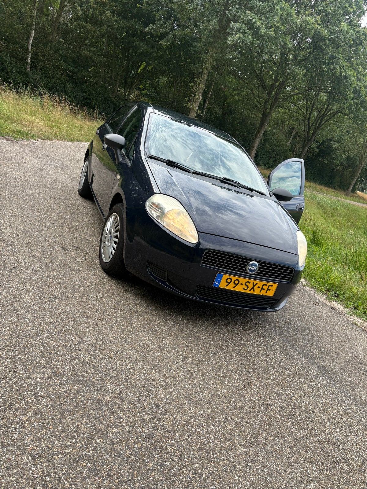 Fiat Punto 1.4 5DR 2006 Blauw, Auto's, Voorwielaandrijving, 40 €/maand, 4 cilinders, Origineel Nederlands