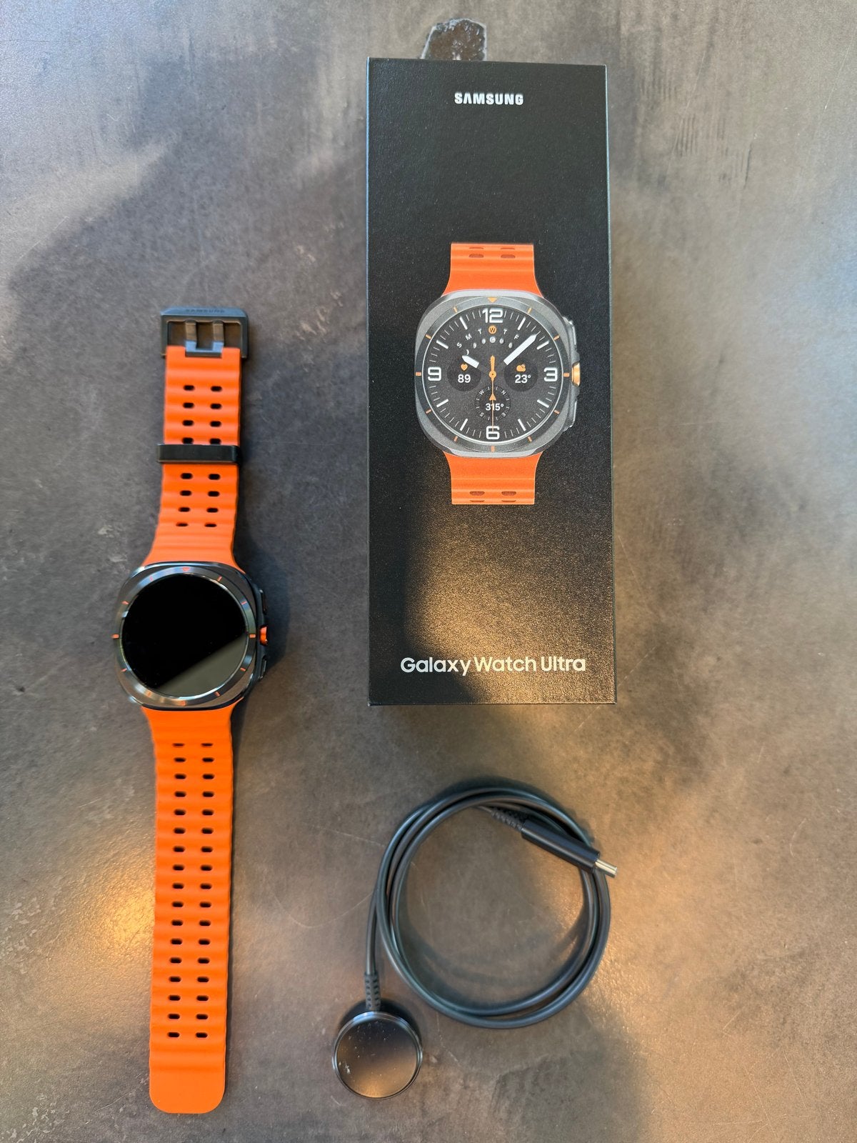 Samsung Galaxy Watch Ultra - Oranje Bandje, Sieraden, Tassen en Uiterlijk, Smartwatches, Afstand, Oranje, Ophalen of Verzenden