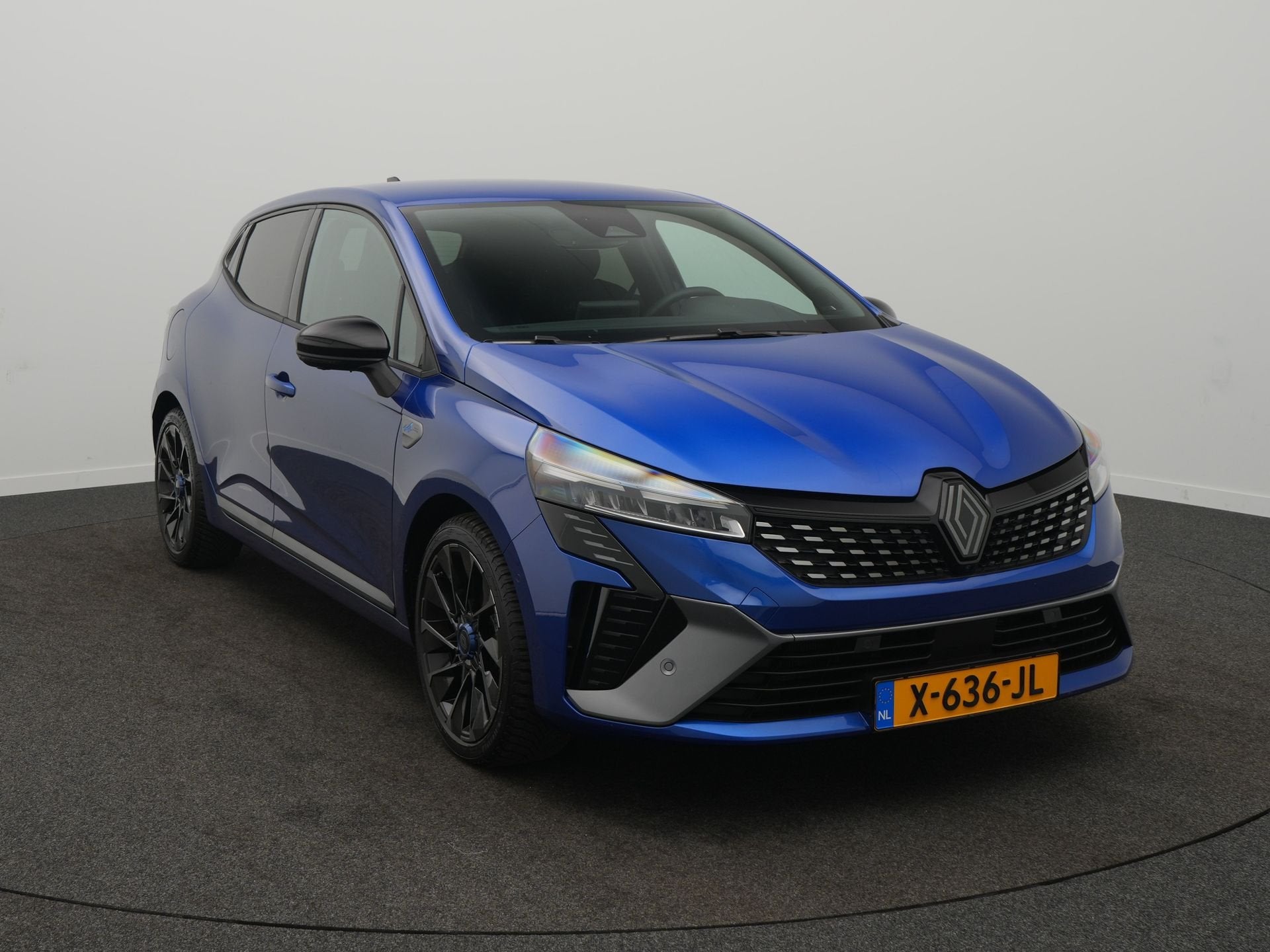 Renault Clio 1.6 E-Tech Full Hybrid 145 esprit Alpine - Bose, 12 maanden, Gebruikt, Blauw, Leder en Stof