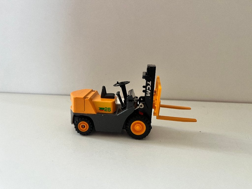 heftruck van TCM inclusief originele doos, Ophalen of Verzenden, Zo goed als nieuw, Hijskraan, Tractor of Landbouw, Overige merken