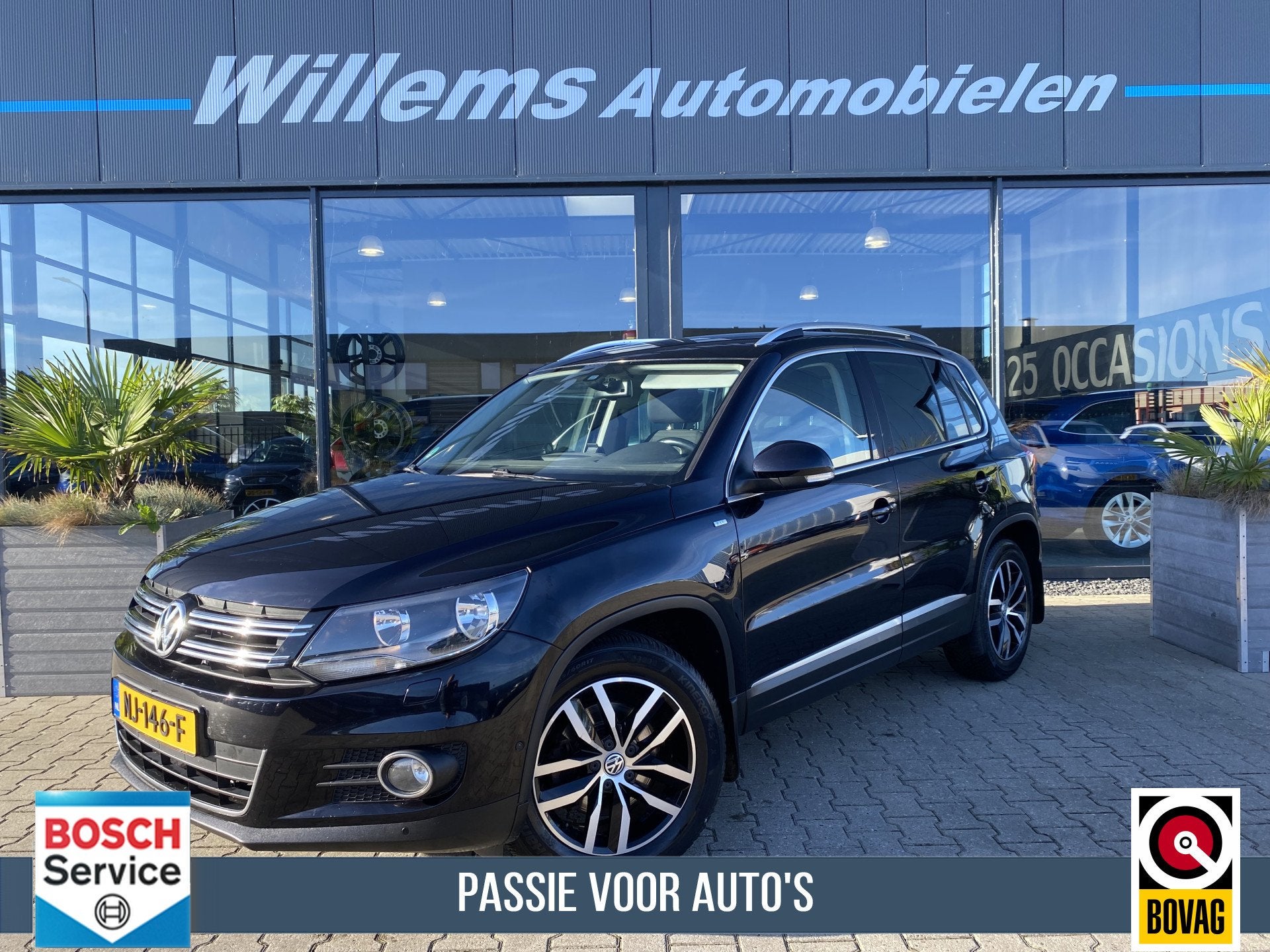 Volkswagen Tiguan 1.4 TSI Sport&Style Stoelverwarming, Trekh, Auto's, Voorwielaandrijving, Euro 5, Zwart, 4 cilinders