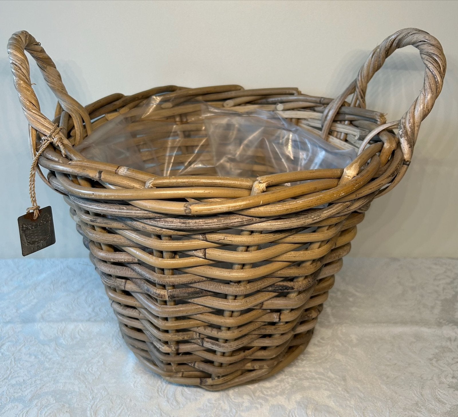 Rotan mand met handvatten en plastic binnenvoering, Huis en Inrichting, Met handvatten, Mand, Rond, Ophalen of Verzenden