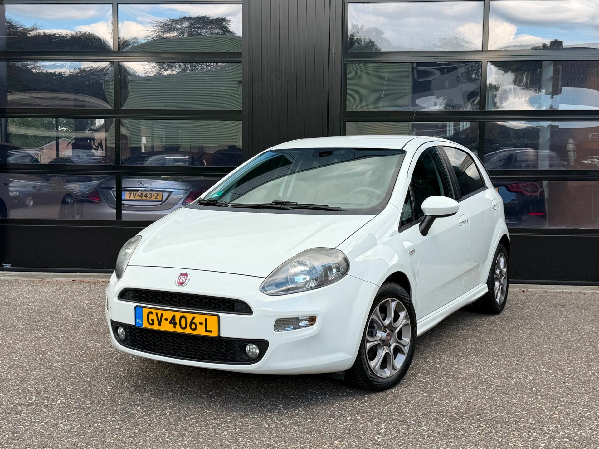 Fiat Punto Evo 0.9 TwinAir Lounge Clima Cruise PDC Blueth., Auto's, Voorwielaandrijving, 101 pk, Gebruikt, Alcantara