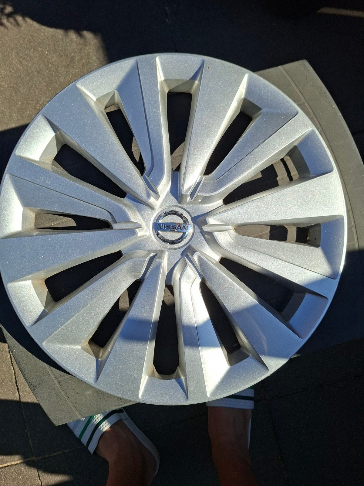 4 wieldoppen Nissan 15 inch, Ophalen, Zo goed als nieuw