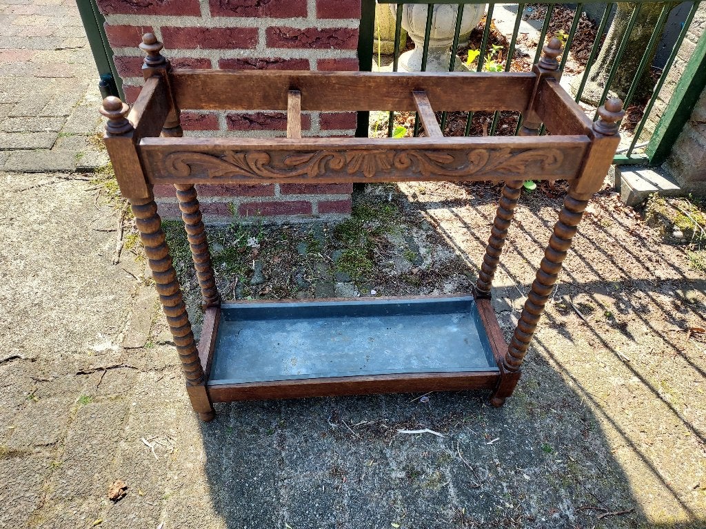 Antieke eiken paraplustandaard met snijwerk., Ophalen of Verzenden