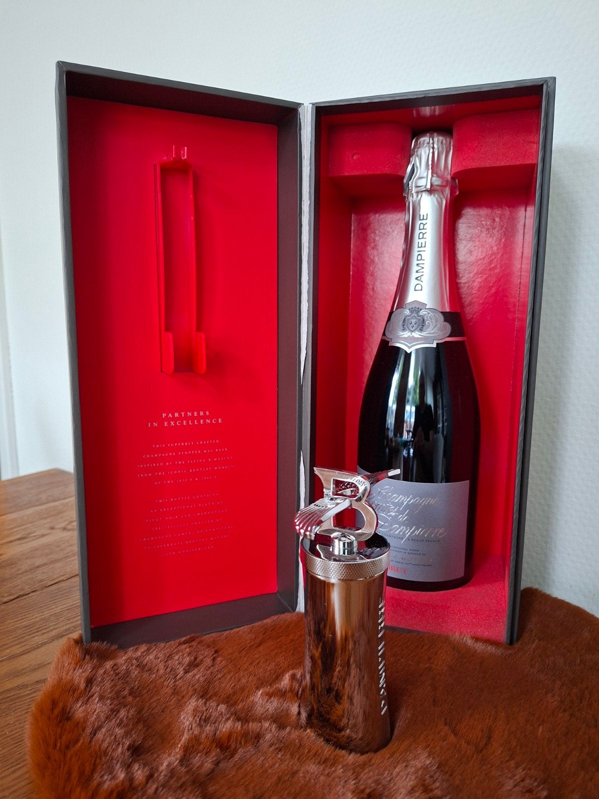 Bentley champagne inclusief Bentley flessenstopper, Ophalen of Verzenden, Zo goed als nieuw, Auto's