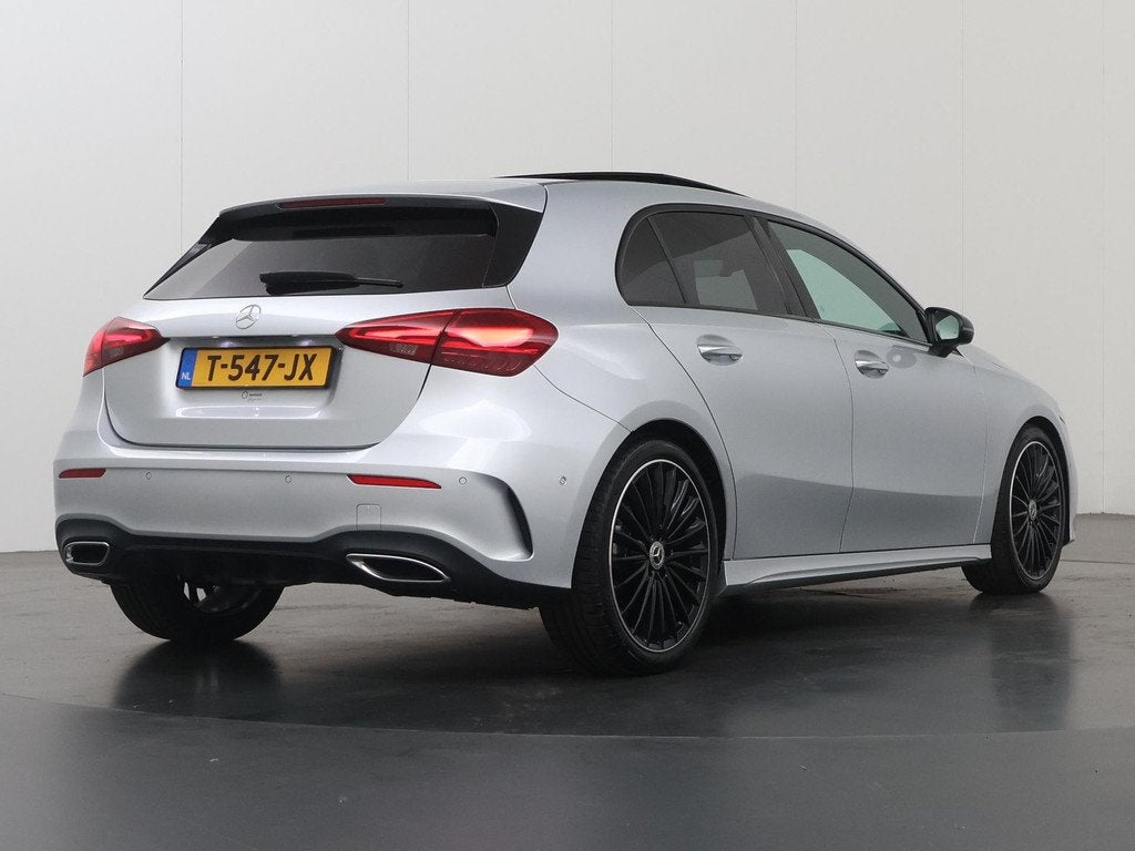 Mercedes-Benz A-klasse 180 AMG Line | Night | Panoramadak |, Auto's, Mercedes-Benz, Gebruikt, 4 cilinders, Leder en Stof, Origineel Nederlands