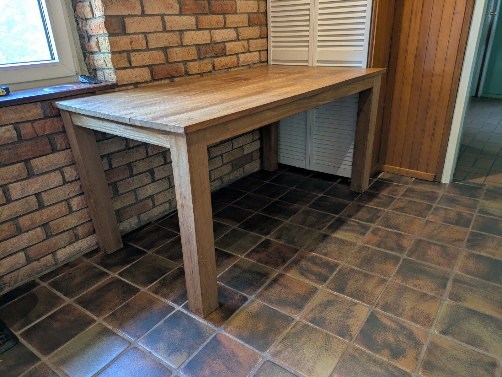Teakhouten tafel, Ophalen