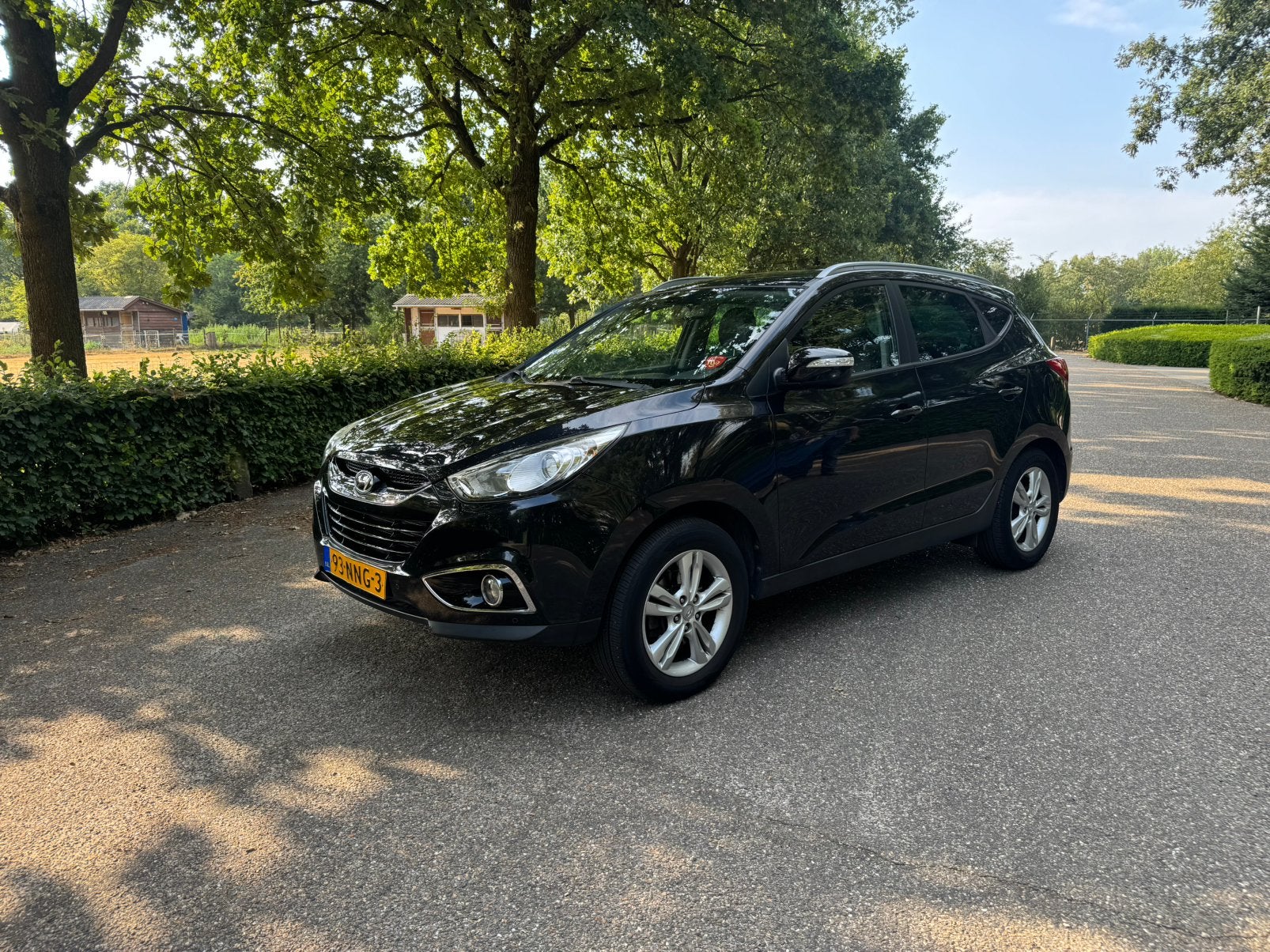 Hyundai iX35 2.0i Cvvt 163pk 2010 Zwart, 1998 cc, 4 cilinders, Parkeersensor, Leder en Stof