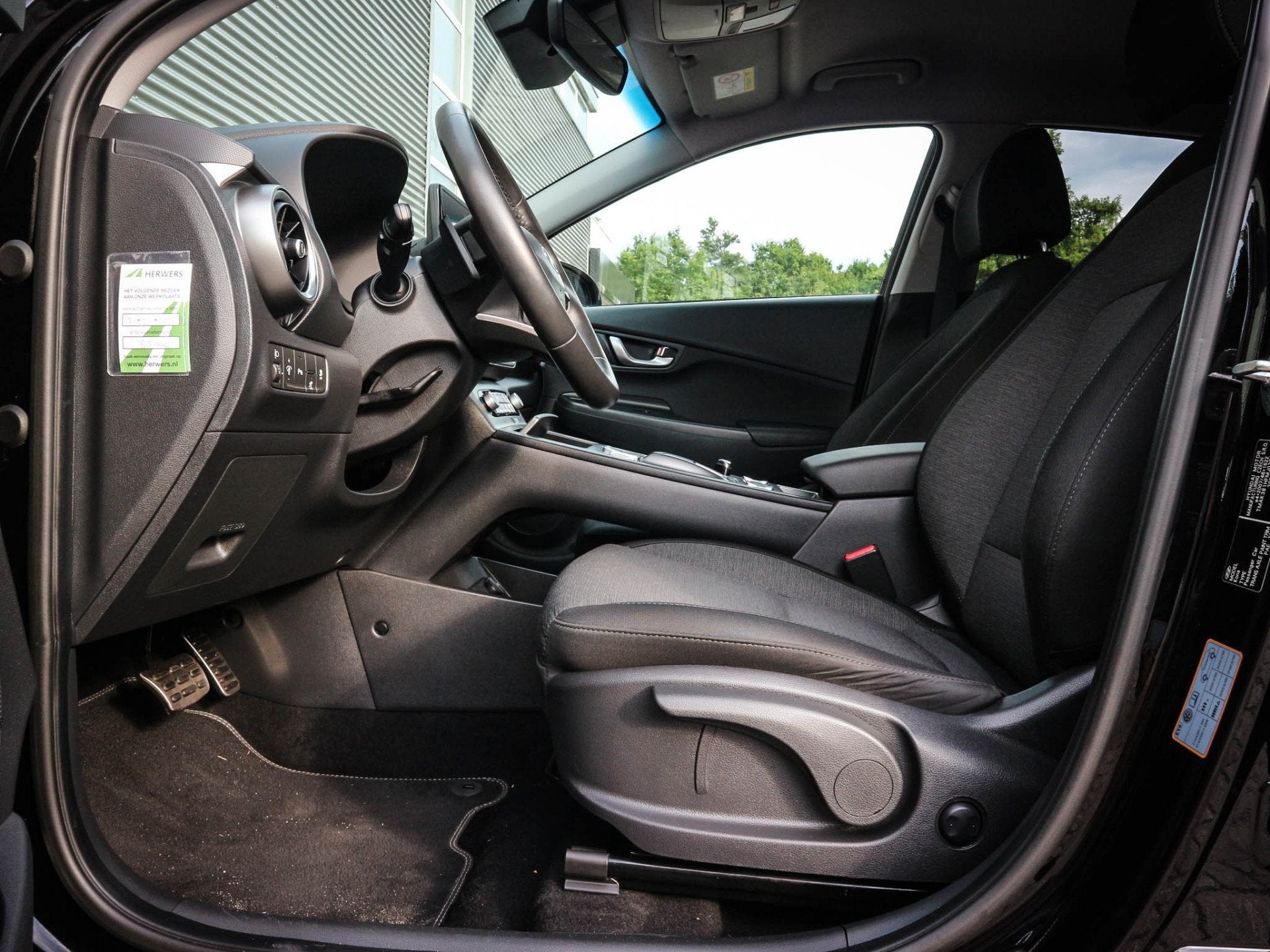 Hyundai KONA EV Comfort 39 kWh | Clima | Cruise | Navi | Pdc, Auto's, Gebruikt, Zwart, SUV of Terreinwagen, 255 min
