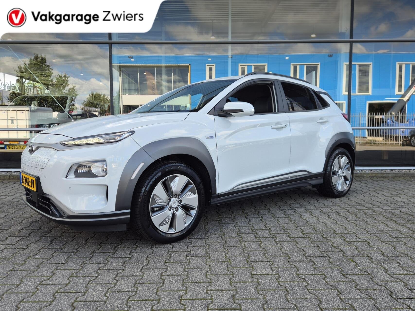 Hyundai Kona EV Premium 64 kWh|SOH 95% |Warmtepomp | Navi| H, Auto's, Gebruikt, Wit, 64 kWh, SUV of Terreinwagen