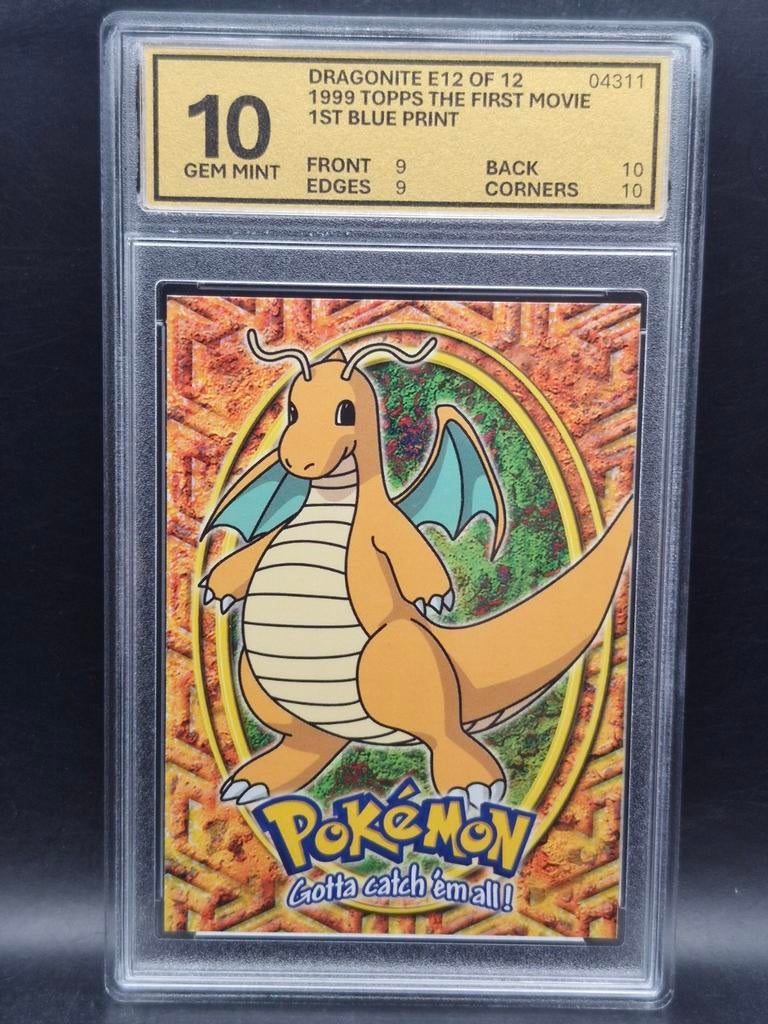 Dragonite 1999 topps the first movie #e12 woetoe grading 10, Verzenden, Zo goed als nieuw, Losse kaart