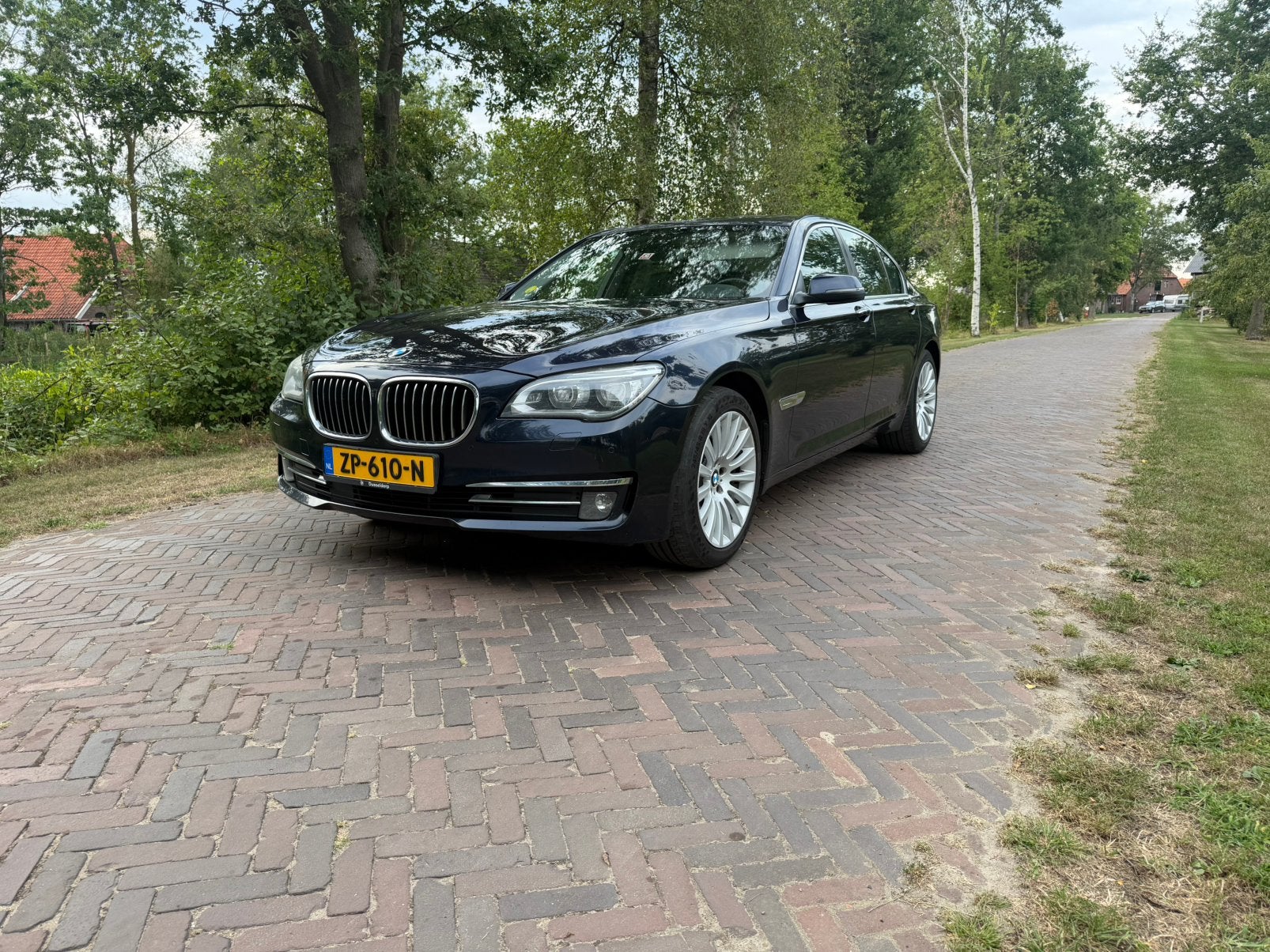 BMW 7-Serie 3.0 730D High Executive 2012 Blauw, Auto's, BMW, Automaat, Achterwielaandrijving, Zwart, 2993 cc