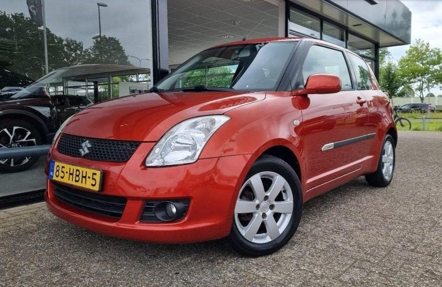 Suzuki Swift Oranje 1.3 2008, Stof, Zwart, 400 kg, Handgeschakeld