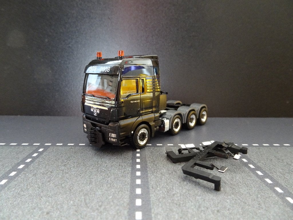 803 herpa man tgx 4-as trekker zwart 1:87 truck trein heavy, Ophalen of Verzenden, Zo goed als nieuw, Bus of Vrachtwagen, Herpa