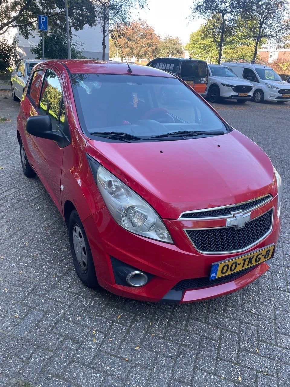Chevrolet Spark 1.0 Bifuel 2012 Rood, 15 km/l, 37 €/maand, 4 cilinders, Origineel Nederlands