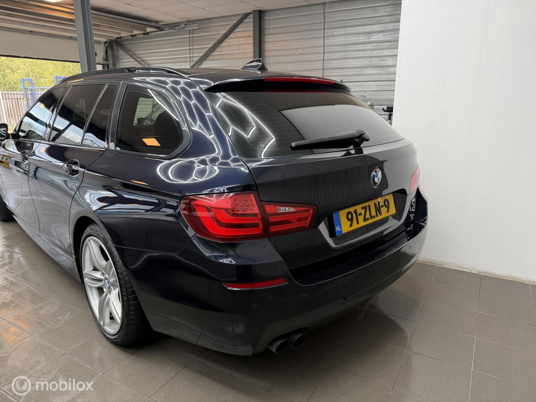 Foto 8 van BMW 5-serie Touring 520i High Executive