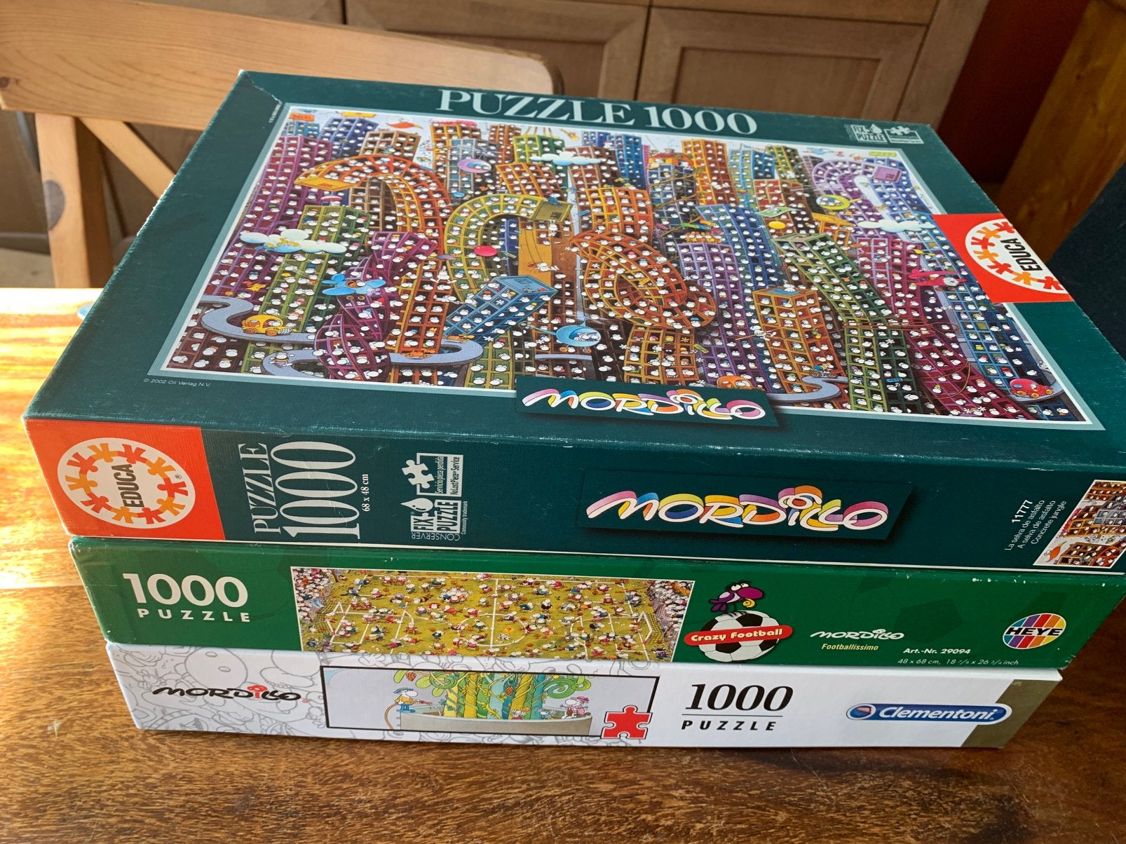 Drie puzzels van Mordillo, voor de Verzamelaar?, Ophalen of Verzenden, 500 t/m 1500 stukjes, Zo goed als nieuw, Legpuzzel
