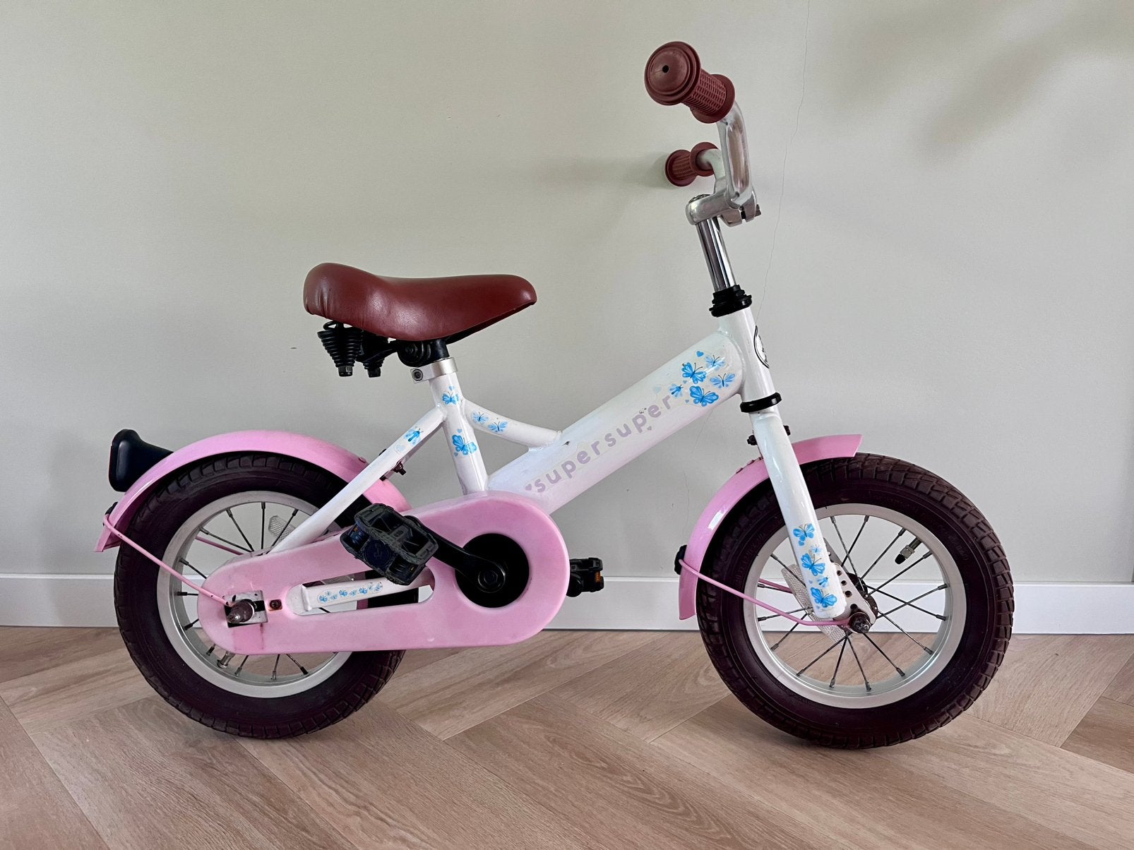 Meisje kinderfiets 12 inch, Fietsen en Brommers, Ophalen, Terugtraprem, Zijwieltjes, Minder dan 16 inch