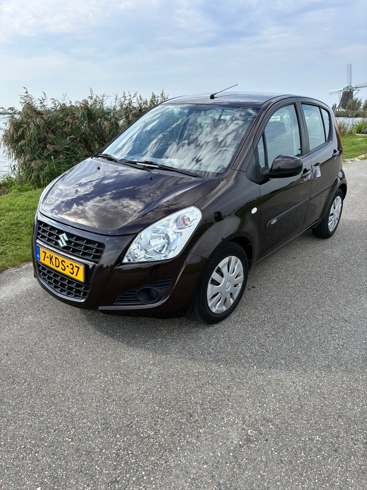 Suzuki Splash 1.2 Comfort Automaat (NAP 2de eig / Airco), Auto's, 40 €/maand, 4 cilinders, Bruin, Origineel Nederlands