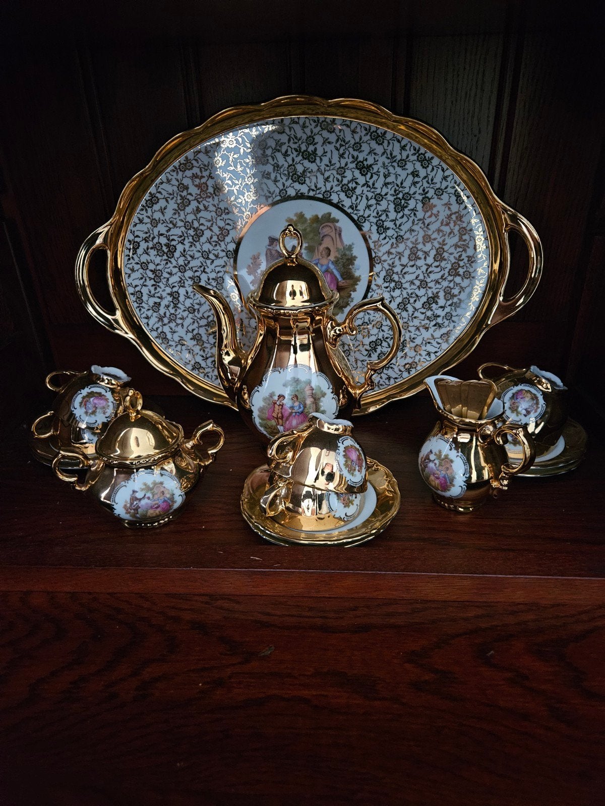 Theeservies Verguld 24 delig, Verzamelen, Ophalen of Verzenden, Zo goed als nieuw, Porselein, Compleet servies