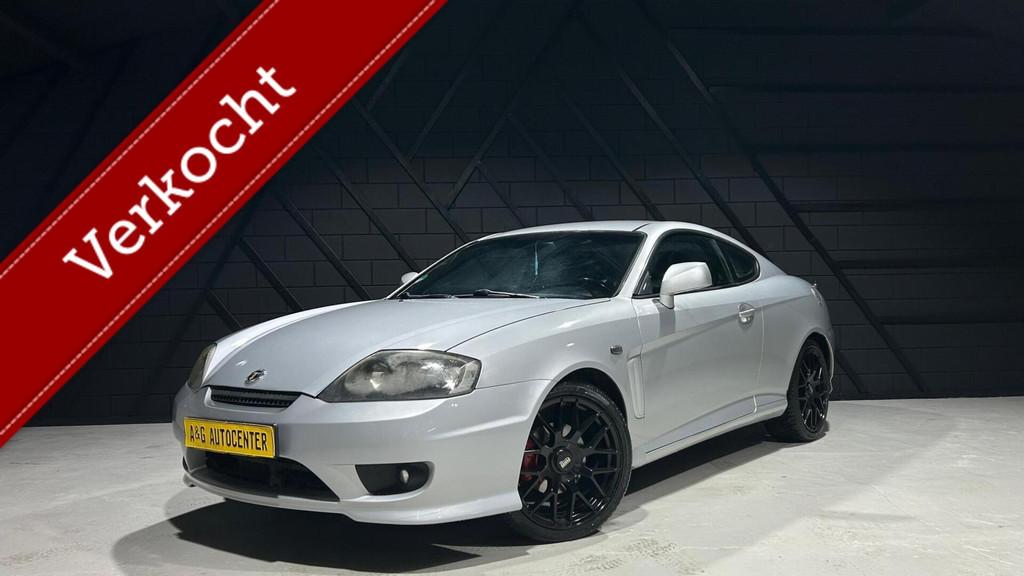 Hyundai Coupé 2.7i Sport/1e Eig/Airco/Leer/18''/168PK/Xenon, Auto's, Hyundai, Gebruikt, Coupé, 4 stoelen, 2656 cc