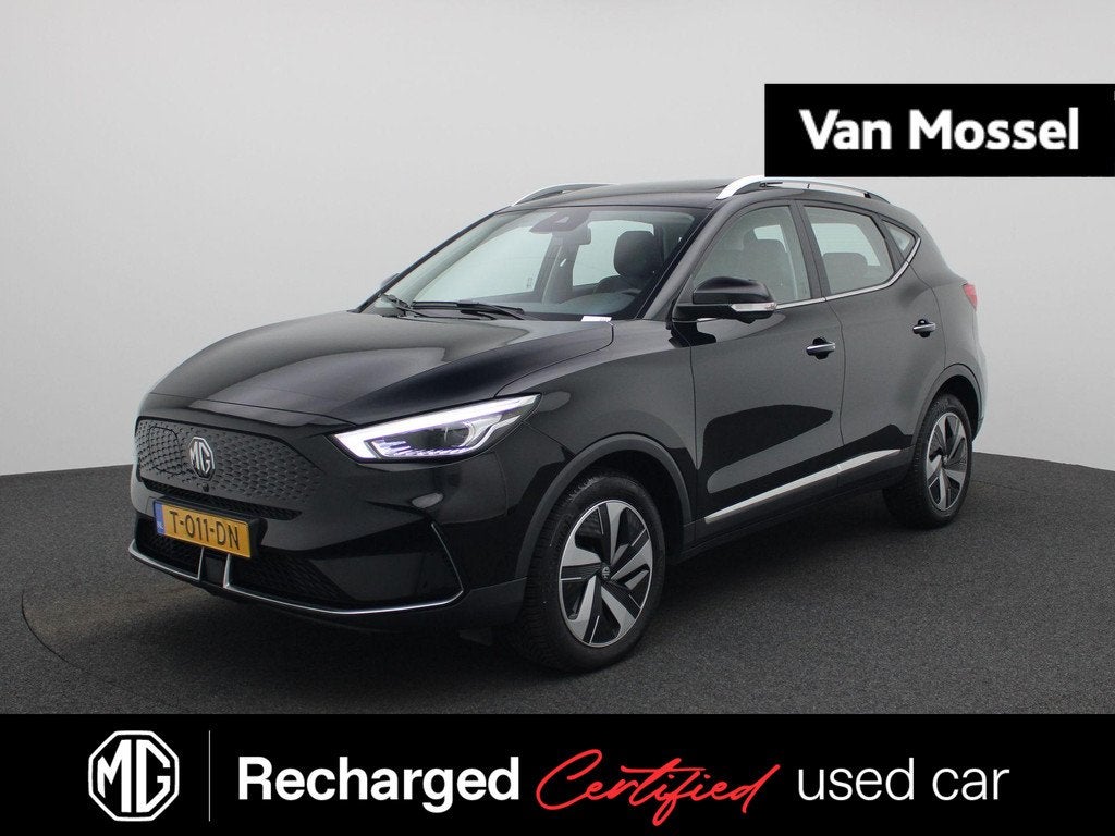MG ZS EV Long Range Luxury 70 kWh | WLTP 440 | Panorama/Schu, Auto's, MG, 12 maanden, Gebruikt, Zwart, ZS