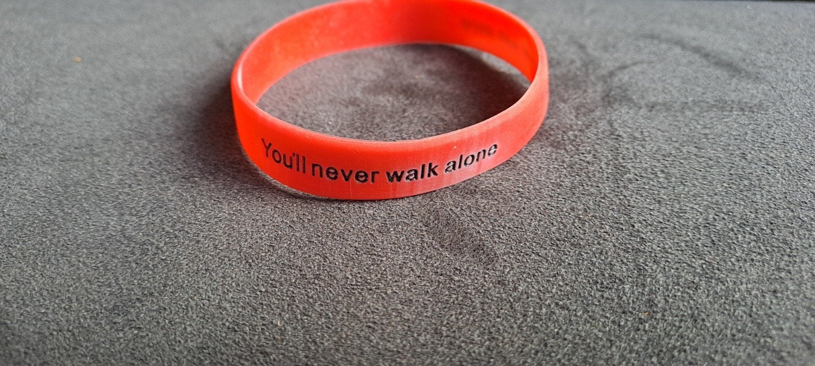 Feyenoord 'You'll Never Walk Alone' siliconen armband, Ophalen of Verzenden, Zo goed als nieuw, Oranje, Overige materialen