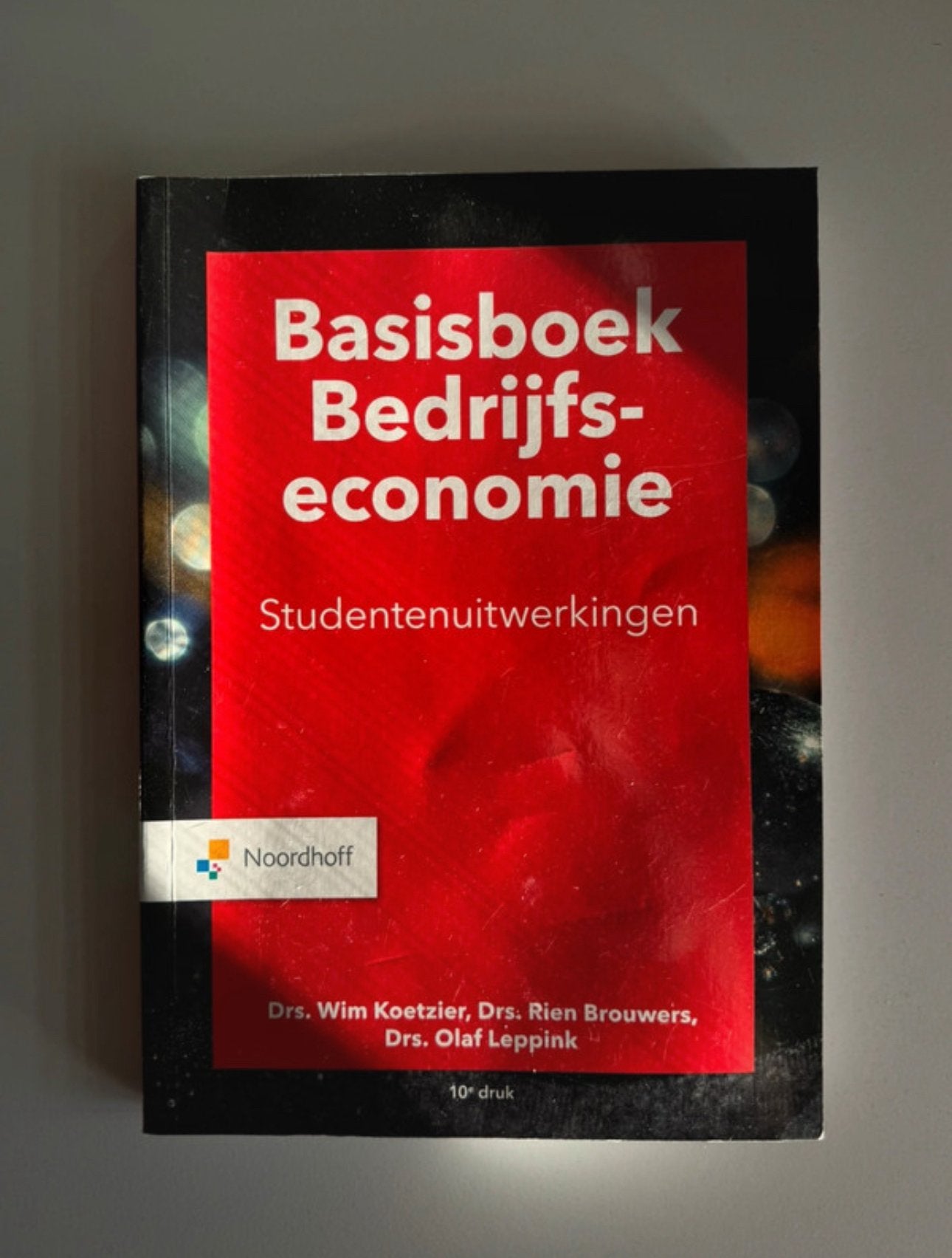 Basisboek bedrijfseconomie - studentenuitwerkingen, Ophalen of Verzenden, Zo goed als nieuw, Economie en Marketing